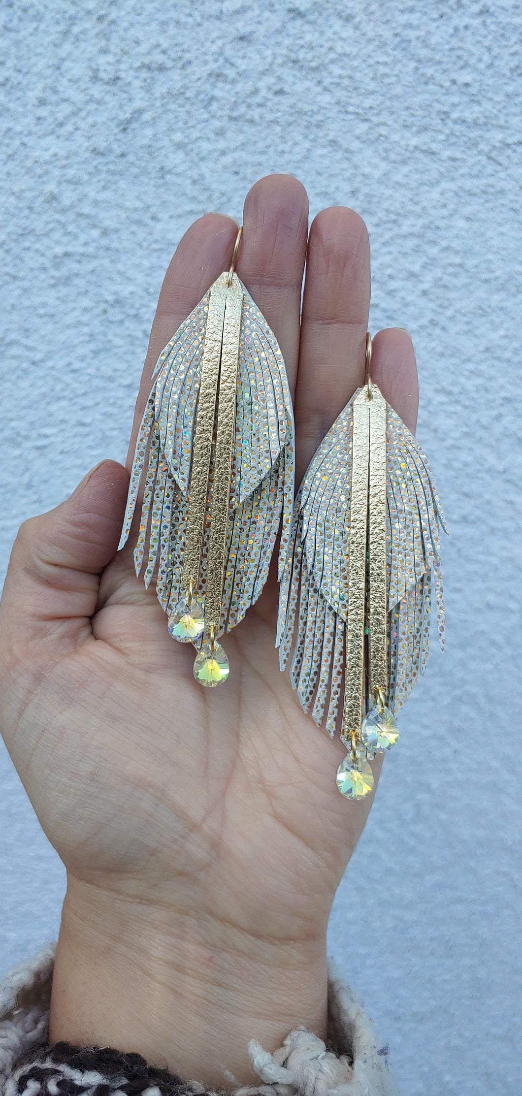 Metallic gold dot feather earrings