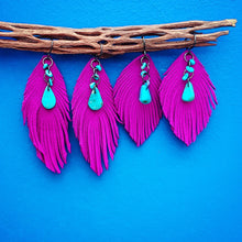 Magenta suede feathers