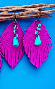 Magenta suede feathers